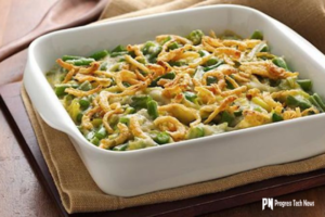 A creamy green bean casserole topped with crispy onions, perfect for a comforting and flavorful side dish.